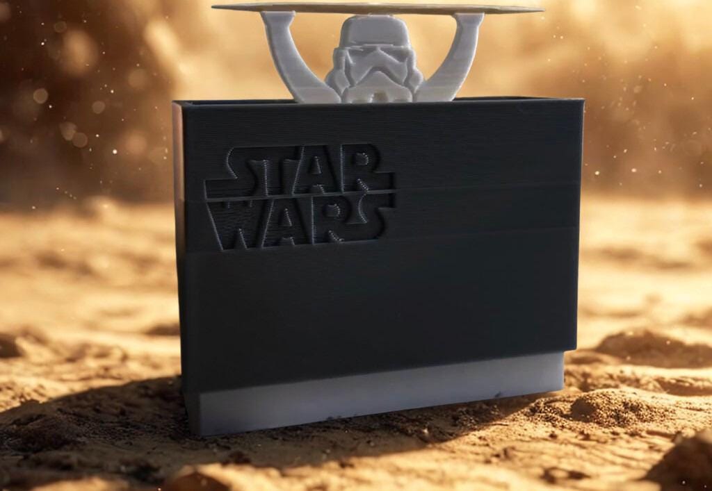 Stormtrooper toothpick dispenser; black Star Wars 3D-printed holder with a gray stormtrooper figure on top.